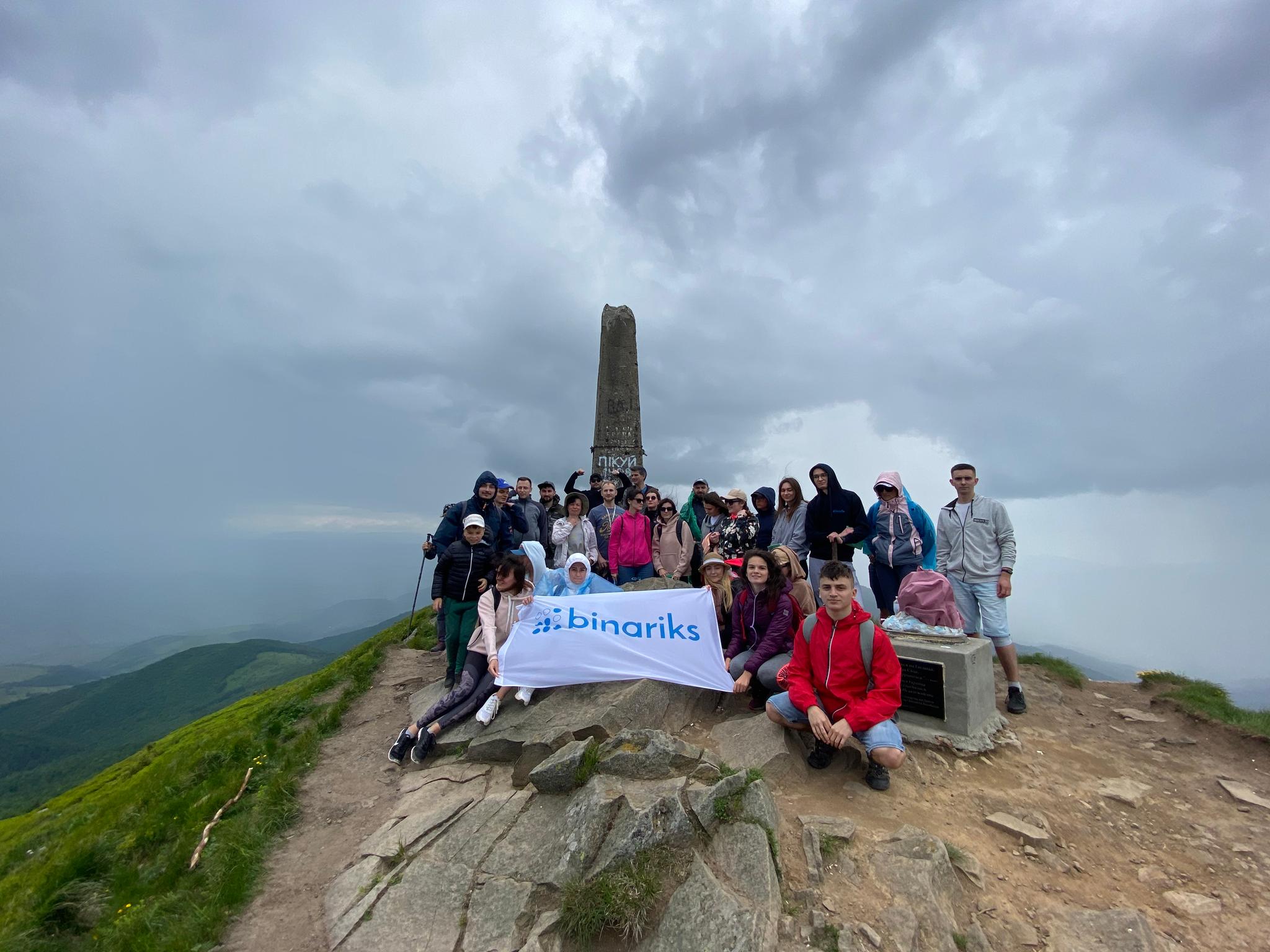 Binariks team hiking to the summit of Mount Pikuy
