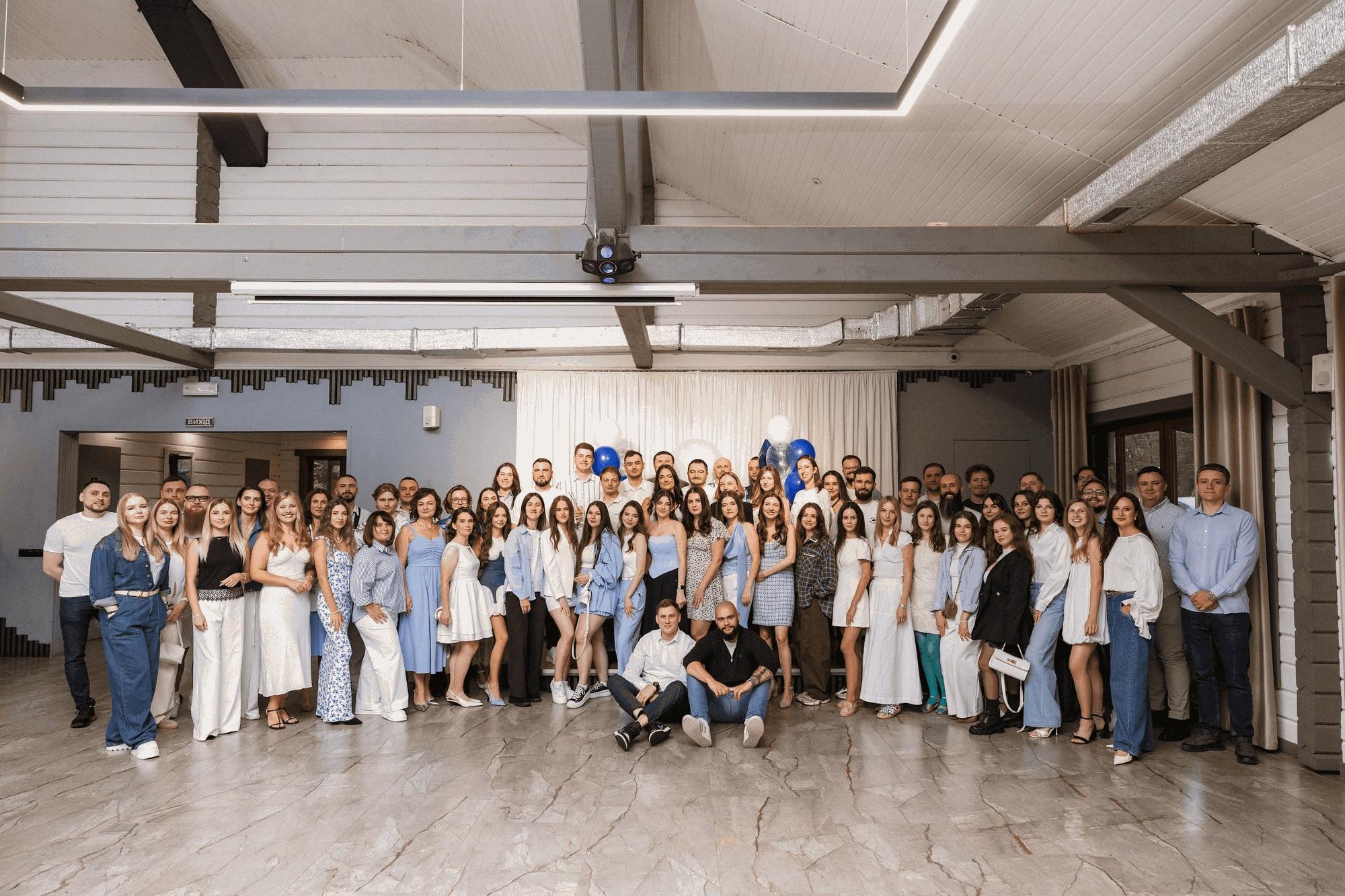 The Binariks team gathered for a group photo at the 10th anniversary party